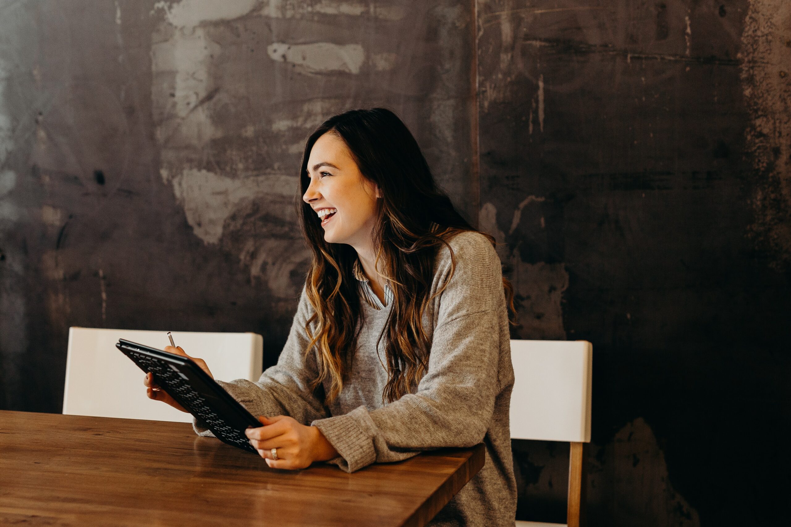 picture of a woman working on an ipad