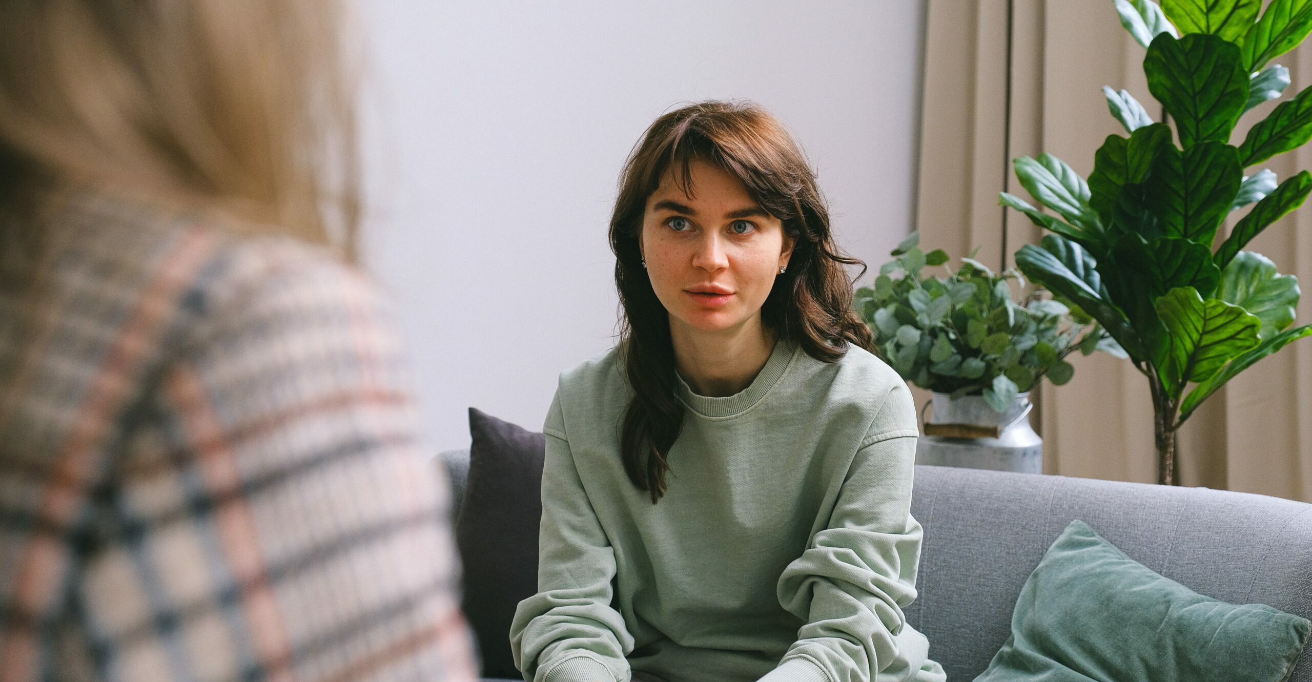 a woman talking to their counsellor