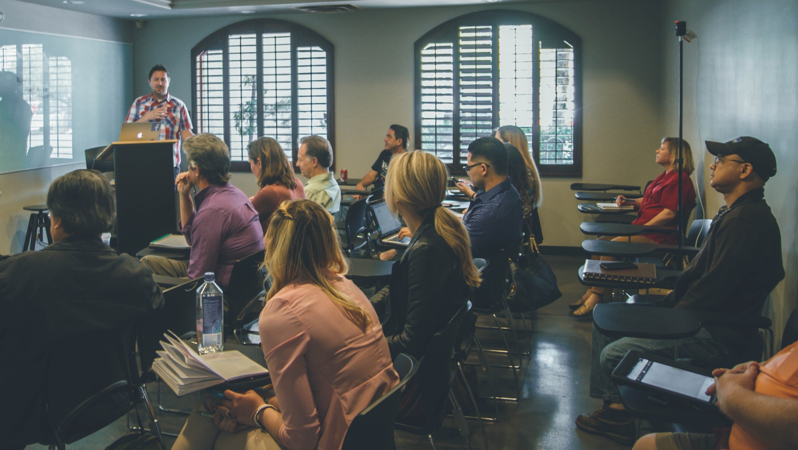 a group of people in a training course for counselling