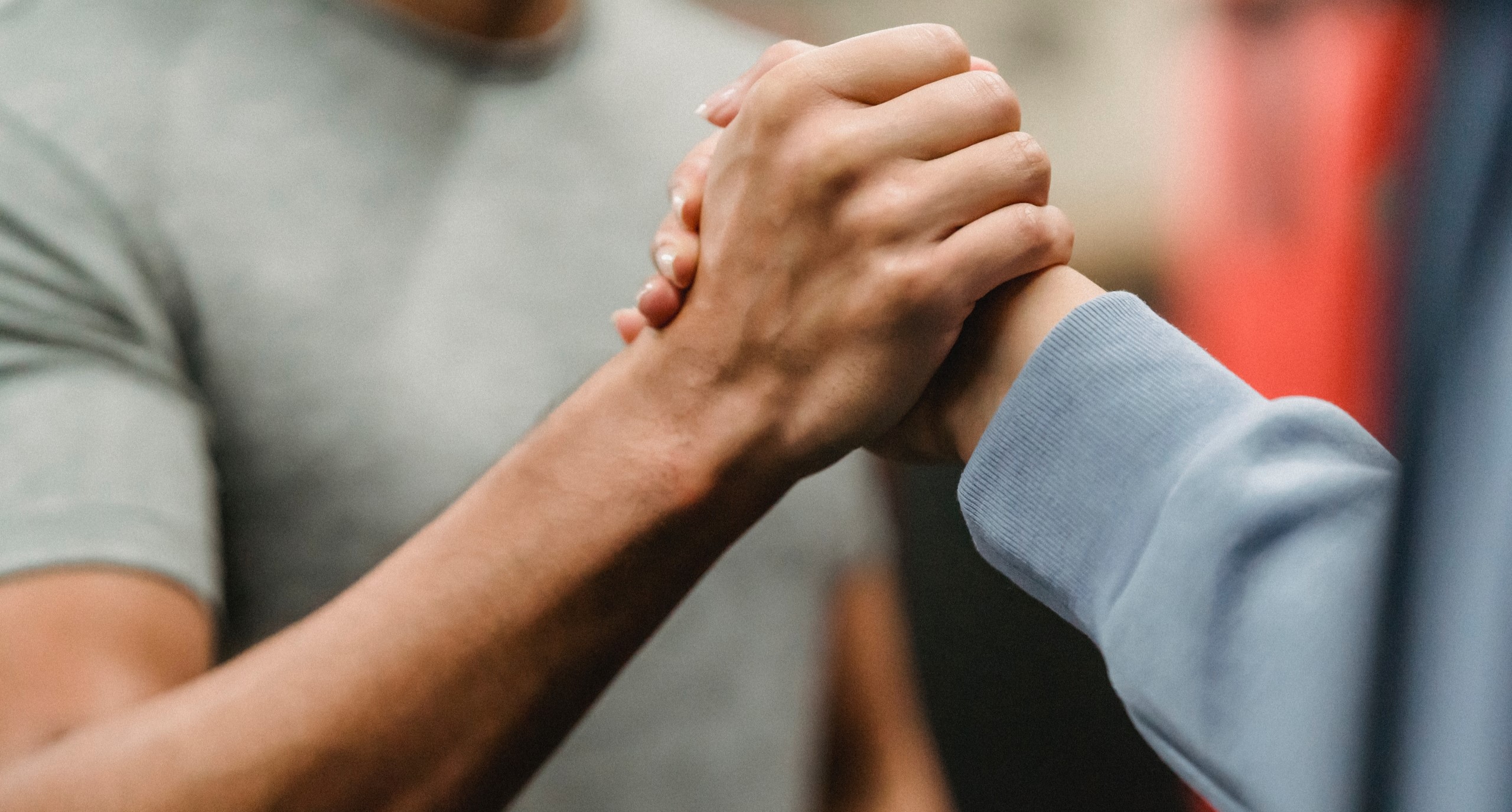 two people shaking hands